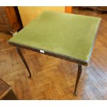 An old square-top card table lined with green baize on cabriole legs,