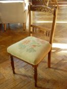 Late Victorian walnut single chair with carved crest rail,