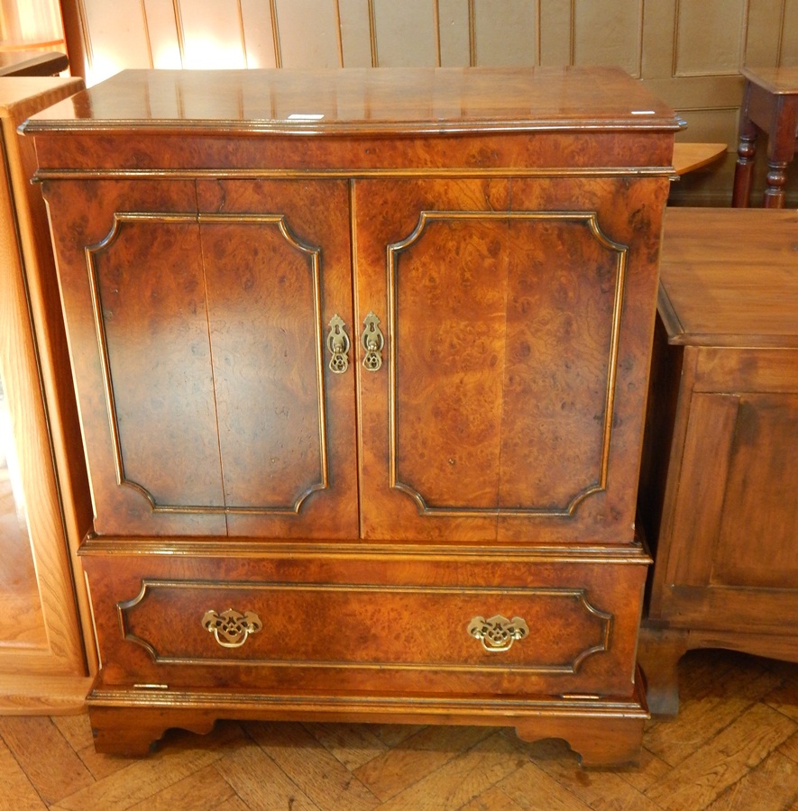 A Georgian style burr walnut television cabinet,