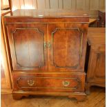 A Georgian style burr walnut television cabinet,