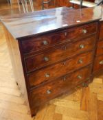 A mahogany small chest of drawers, with four graduating drawers with stringing, brass knob handles,