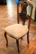 Set of six beech dining chairs with pierced splat backs,