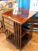 An Edwardian mahogany revolving bookcase, the top inlaid with foliate scroll circular cartouche,