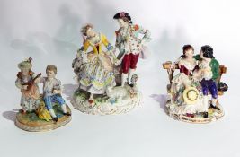 Dresden porcelain figure group of girl and boy, the girl playing mandolin,