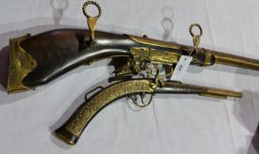 A decorative facsimile pistol and rifle (2)