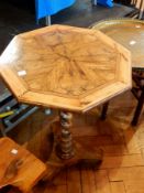 A figured olive wood and parquetry inlaid octagonal occasional table with Hebrew writing,