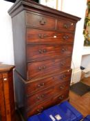 George III mahogany chest on chest with dentil cornice,