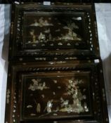 A pair of Oriental hardwood plaques with mother-of-pearl decoration,