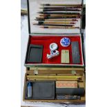 Two boxes of Chinese writing/painting sets