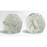 Two bubble glass paperweights