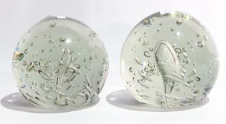 Two bubble glass paperweights