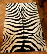 A zebra print carpet,
