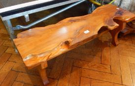 A yew wood coffee table in rustic form