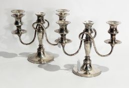 Pair of silver plate on copper 3-branch candelabra with reeded borders and circular foot,