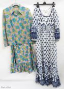 Various 1970's vintage maxi dresses including white cotton printed with a blue pattern, a