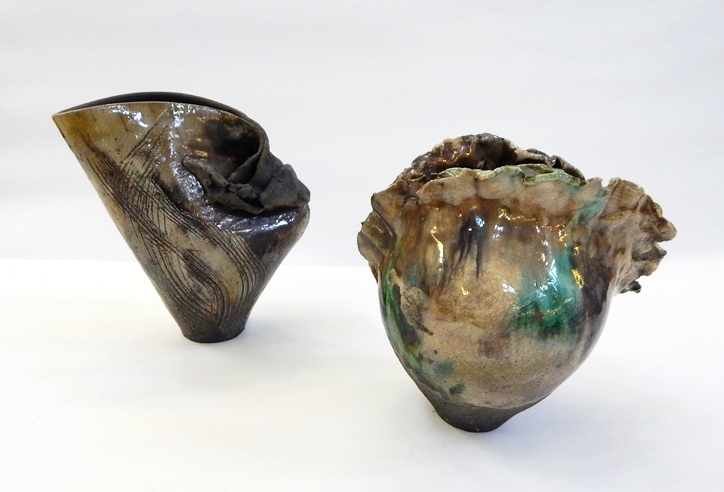Two studio stoneware raku type vases of organic shape, 20cm and 18.