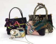 A quantity of skin and other ladies vintage handbags (1 box)