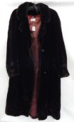 A faux-beaver coat by Penny Plain  Live Bidding: If you would like a condition report on this lot,