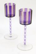 Pair Otto Prutscher by Meyr's Neffe purple and gilt cased and cut stemmed wines,