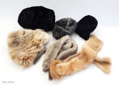A vintage reindeer hat from Oslo, a mink tippet, an astrakhan hat, a grey mink tippet and various