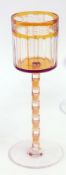 Otto Prutscher by Meyr's Neffe cased and cut amber stemmed wine glass,