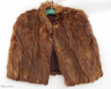 A vintage fox cape, a fox scarf, a musquash tippet and various other pieces (1 box)  Live Bidding: