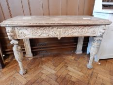 A Victorian carved limed oak Renaissance style side table, with gadrooned borders,
