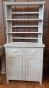 Early 20th century painted pine kitchen dresser, with two shelf open rack, two frieze drawers,
