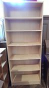 A modern wood effect open bookcase of six adjustable shelves, width 80cm,