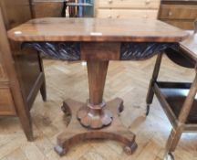 A rectangular top side table with floral carving, on octagonal tapering base,