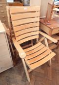 Two beech ladderback reclining chairs (2)