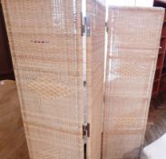 An Ikea canework threefold screen,