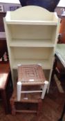 A painted open four shelf bookcase,