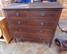 An oak chest of two short and three long drawers, with satinwood stringing, oval handles,