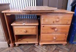 A modern pine dressing table with three side drawers, width 113cm,