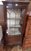 Early 20th century mahogany glazed bookcase, with inlaid dentil cornice,