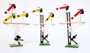 Three Hornby double gantry signals with green bases,