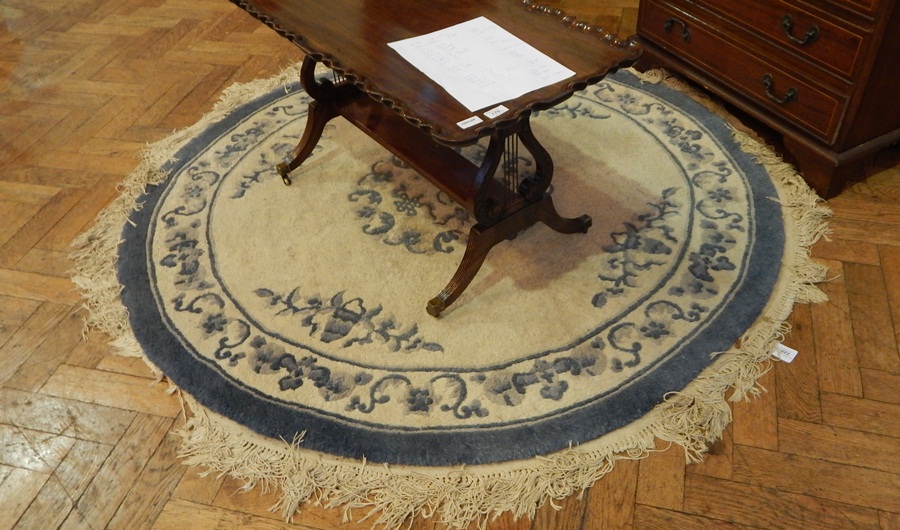 Chinese style wool rug with cream field and floral decoration, floral blue border,