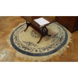 Chinese style wool rug with cream field and floral decoration, floral blue border,