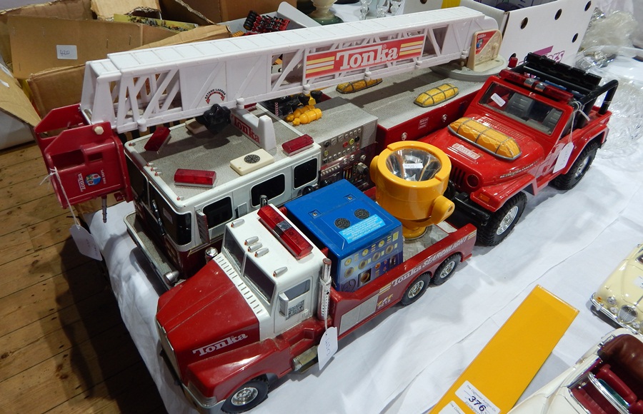 Three Tonka plastic vehicles to include fire engine, etc.