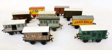 Ten Hornby 'O' gauge closed trucks to include one for Fyffes Bananas and another for Saxa Salt (10)