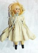 SFBJ bisque headed doll marked "SFBJ 60, Paris 13/0" with painted features, wooden painted body,