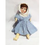 German bisque headed doll with impressed crown and "W" mark, having blue sleeping eyes, open mouth,