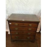 An 18th century mahogany batchelor's chest with satinwood stringing,