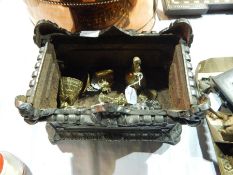 A small brass fire basket, brass bells,