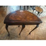 Georgian style walnut demi-lune foldover top card table with baize lined interior on shell carved