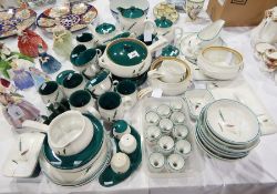 A large quantity of Denby "Green Wheat" pattern dinnerware including covered casseroles, eggcups,