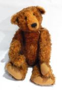 A collectors bear made by Donna Hinkelman for Bainbridge Bears, orange and black mohair,
