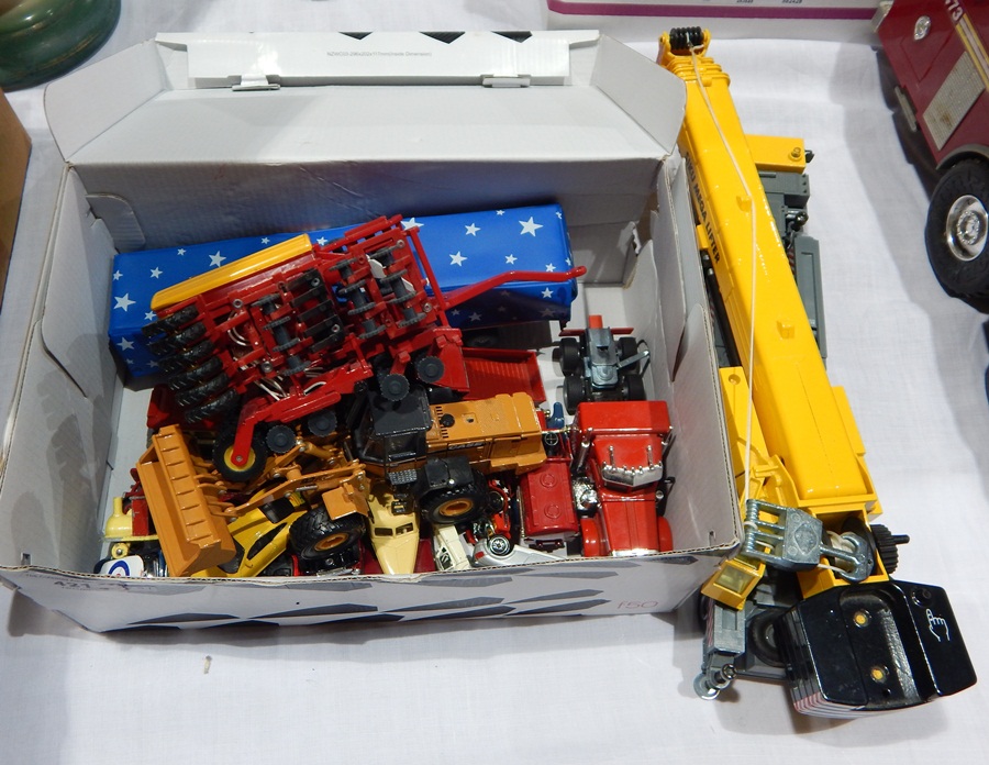 A quantity of diecast vehicles, etc.