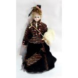 Bisque fashion doll (probably French), shoulder head with kid body, wearing corset, velvet Victorian